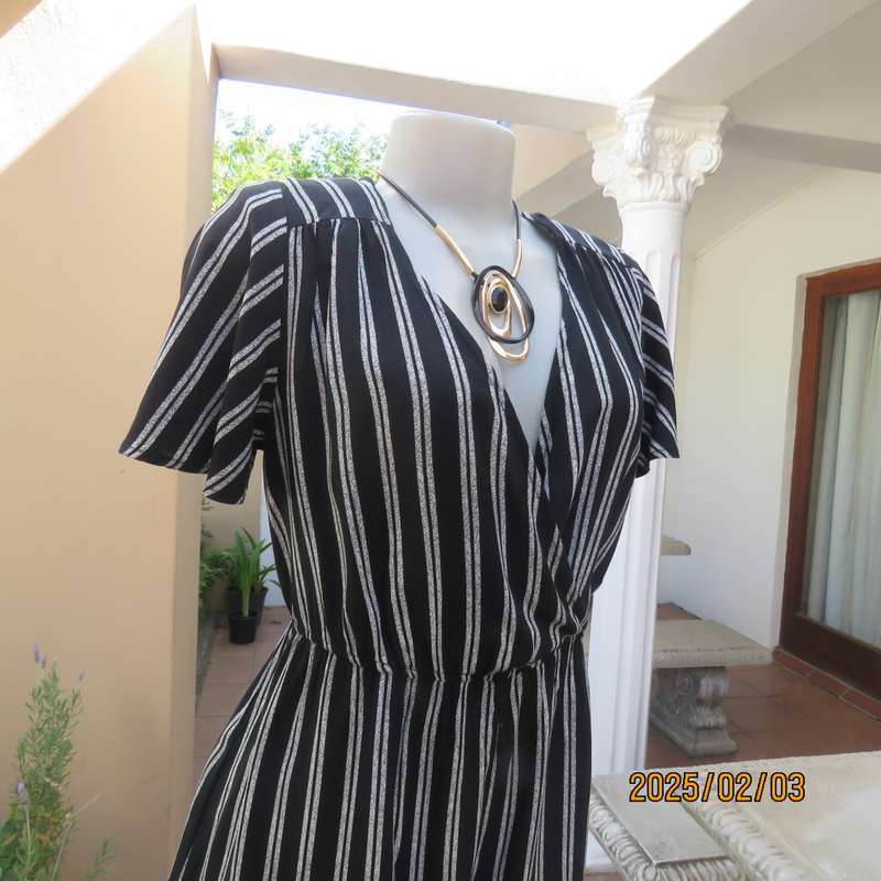 XHILARATION  black-white vertical rayon short jumpsuit size 38. Bust area foldover.Elasticated waist