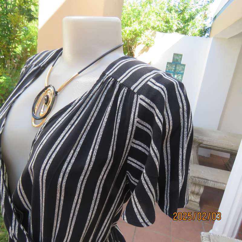 XHILARATION  black-white vertical rayon short jumpsuit size 38. Bust area foldover.Elasticated waist