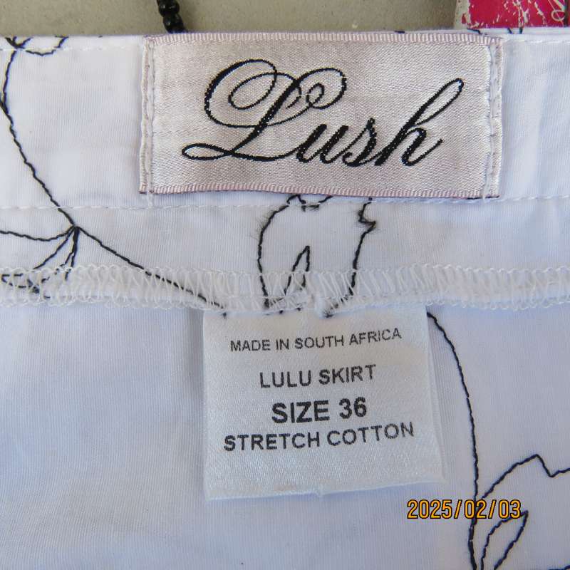 LUSH white stretch cotton skater skirt- side pleats. Wide yoke. Close with 3 side buttons. Size 36