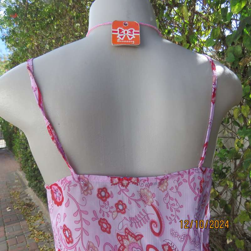 Chic slightly creased polyester pink top/red patterns. Size 34. Peplum frill.Drawstring waist.As new