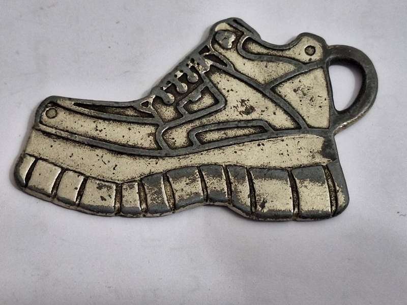 Vintage metal Bronx tag