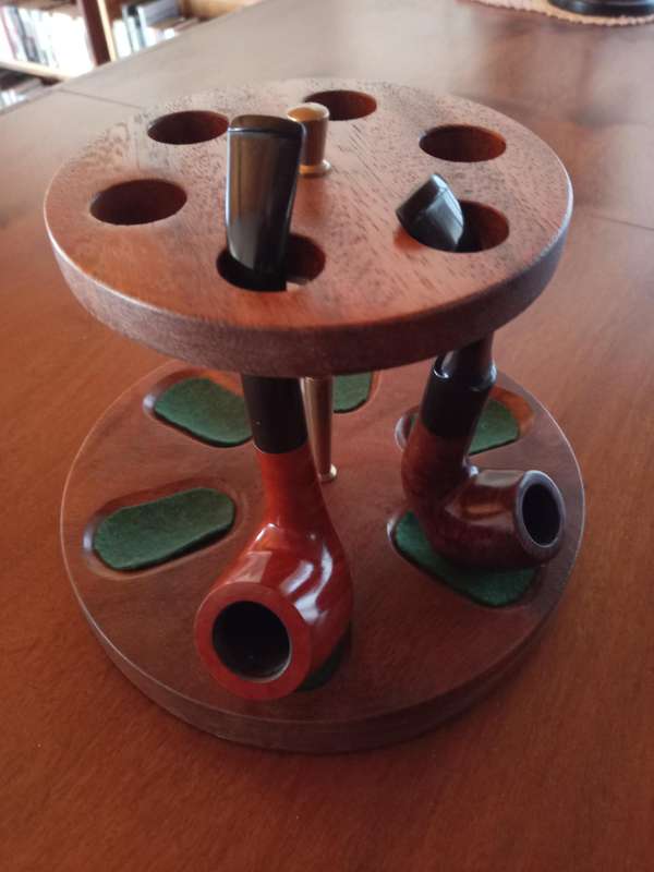 Pipe stand and two smoking pipes