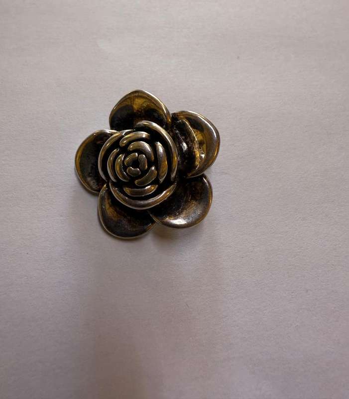 Sterling silver hollow rose pendant