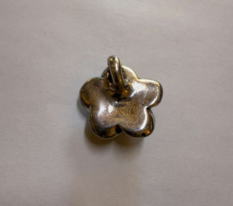 Sterling silver hollow rose pendant