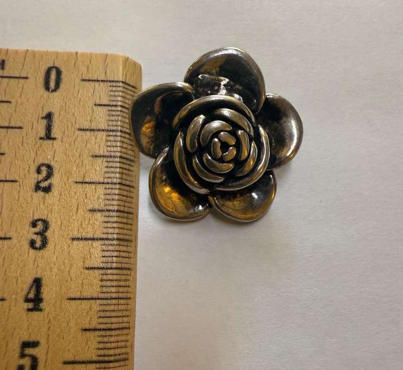Sterling silver hollow rose pendant