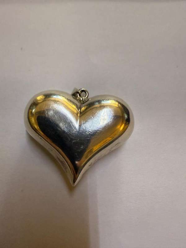 Sterling silver hollow heart pendant