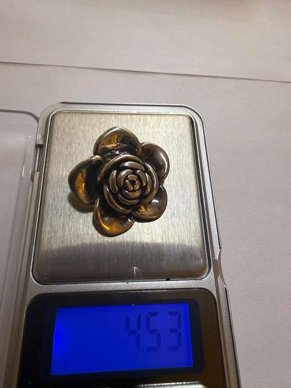 Sterling silver hollow rose pendant