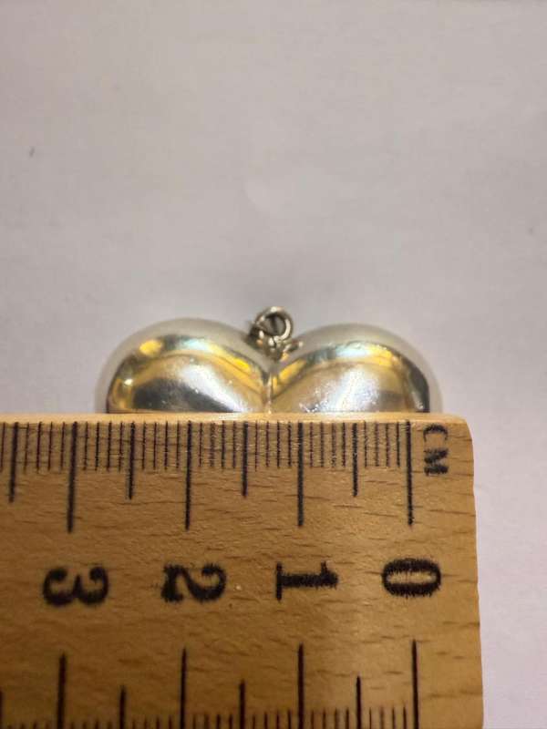 Sterling silver hollow heart pendant