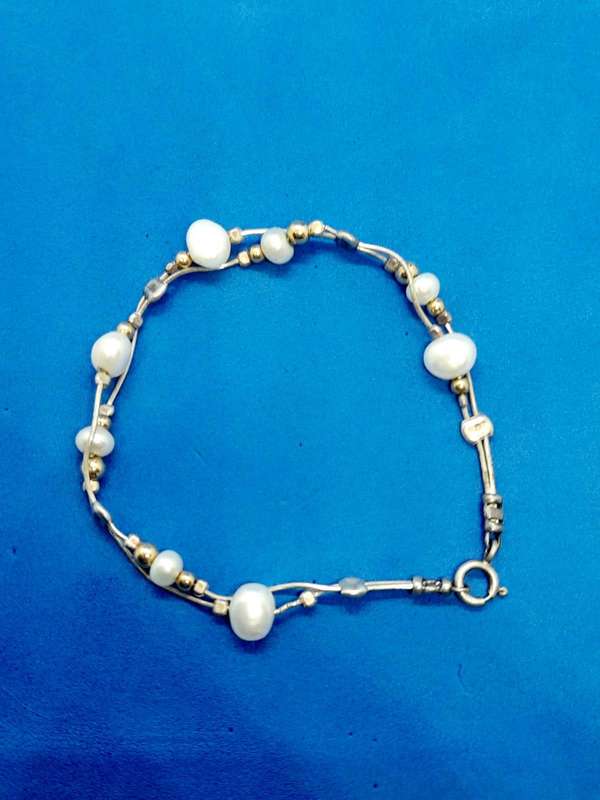 Gold and silver Pearl bracelet.