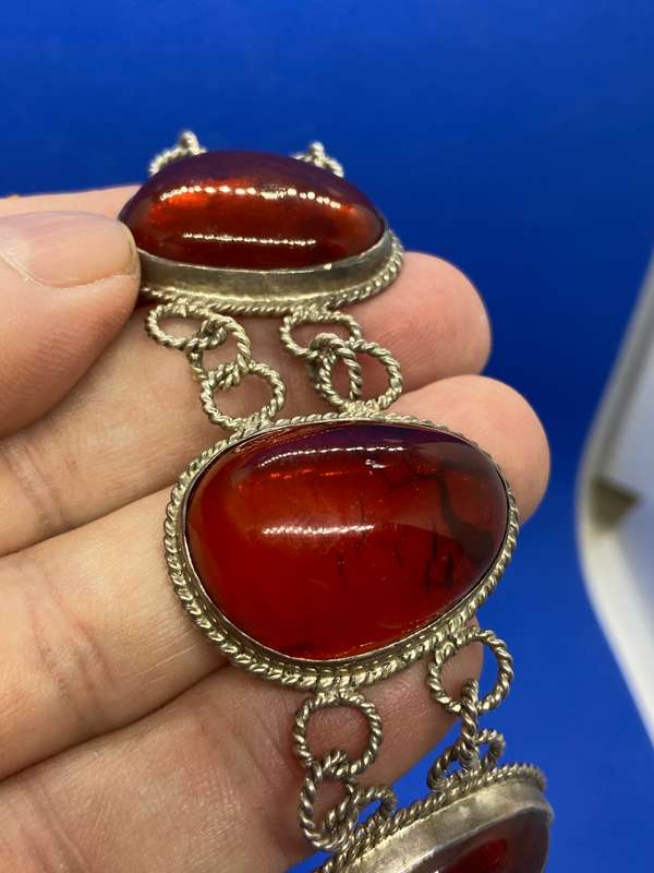 Silver bracelet with large amber stones