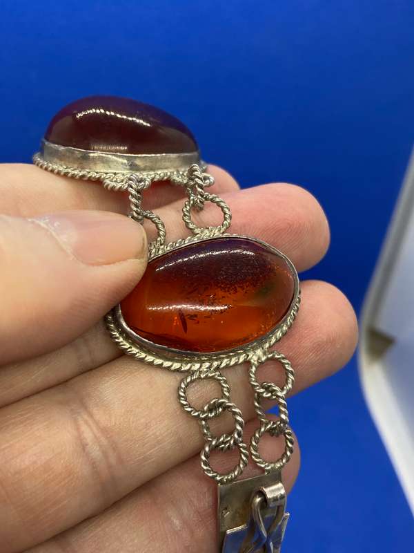 Silver bracelet with large amber stones