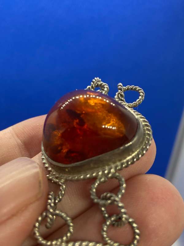 Silver bracelet with large amber stones