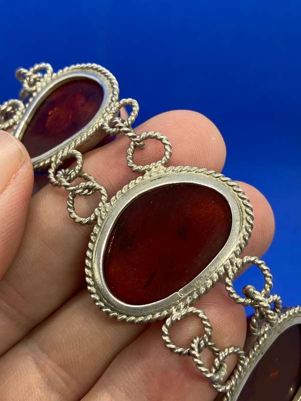 Silver bracelet with large amber stones