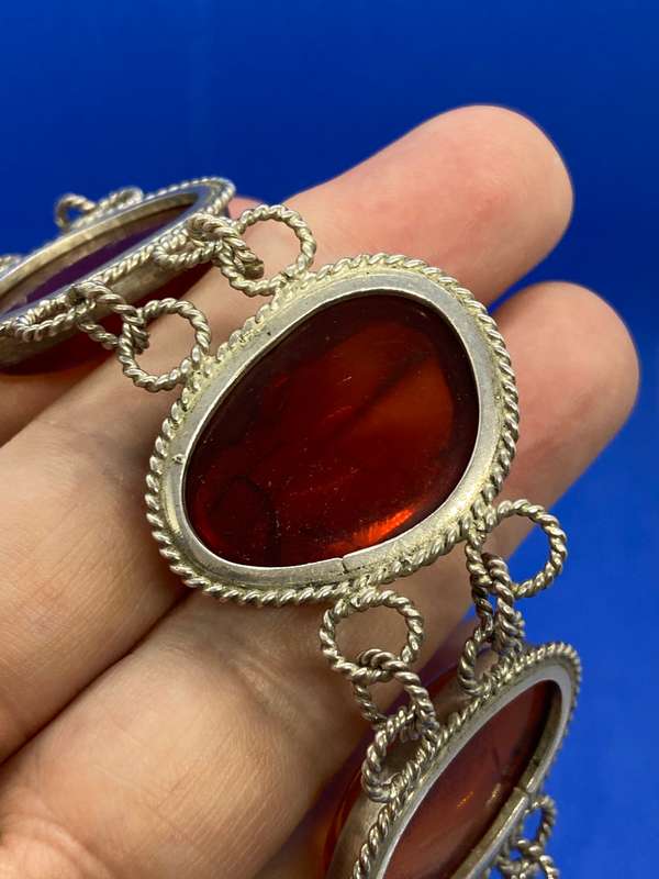 Silver bracelet with large amber stones
