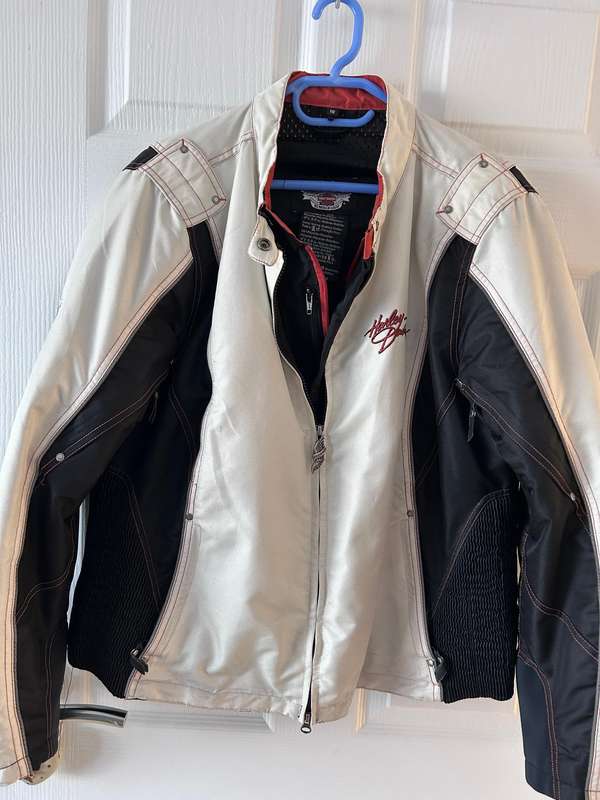 Harley-Davidson motorcycle jacket with a bold design in white, black, and red accents.