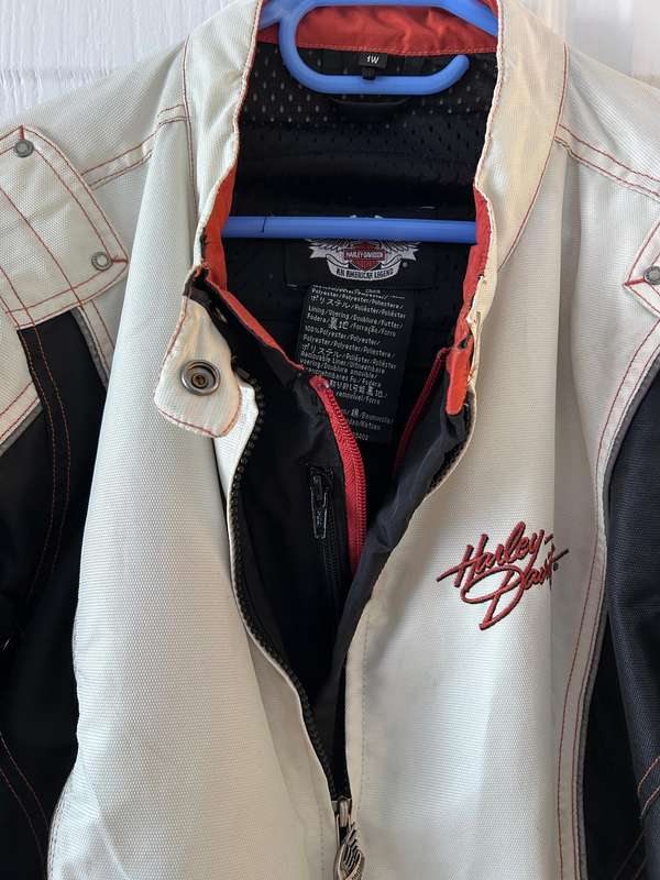 Harley-Davidson motorcycle jacket with a bold design in white, black, and red accents.