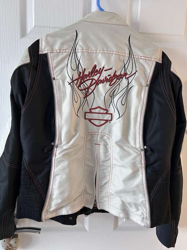Harley-Davidson motorcycle jacket with a bold design in white, black, and red accents.