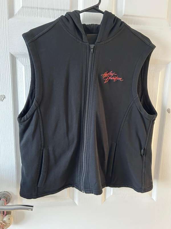 Harley-Davidson motorcycle jacket with a bold design in white, black, and red accents.