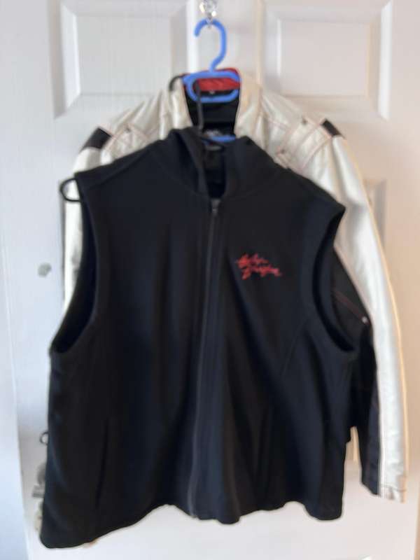 Harley-Davidson motorcycle jacket with a bold design in white, black, and red accents.