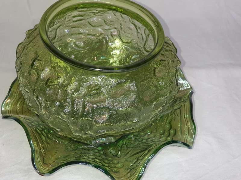 AN ED BRODY  CO, OLIVE GREEN PLANTER OR VASE WITH A OLIVE GREEN BASE PLATE