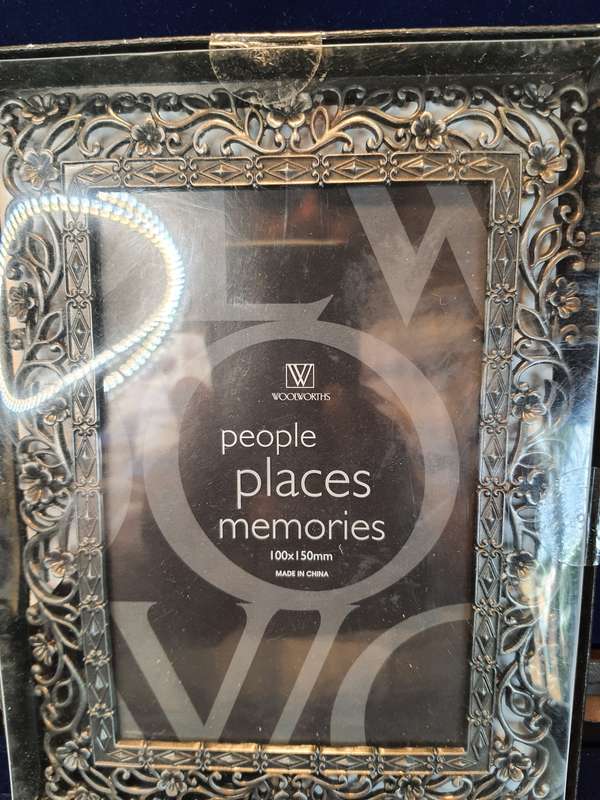 TWO VINTAGE ORNATE PHOTO FRAMES SOLD AS IS