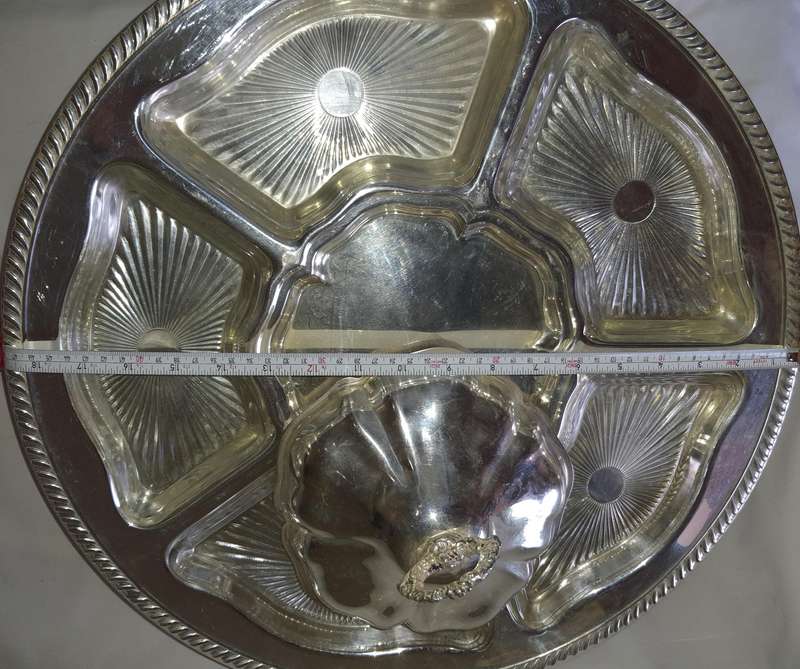 A VINTAGE SILVER PLATED LAZY SUZAN WITH GLASS INSERTS