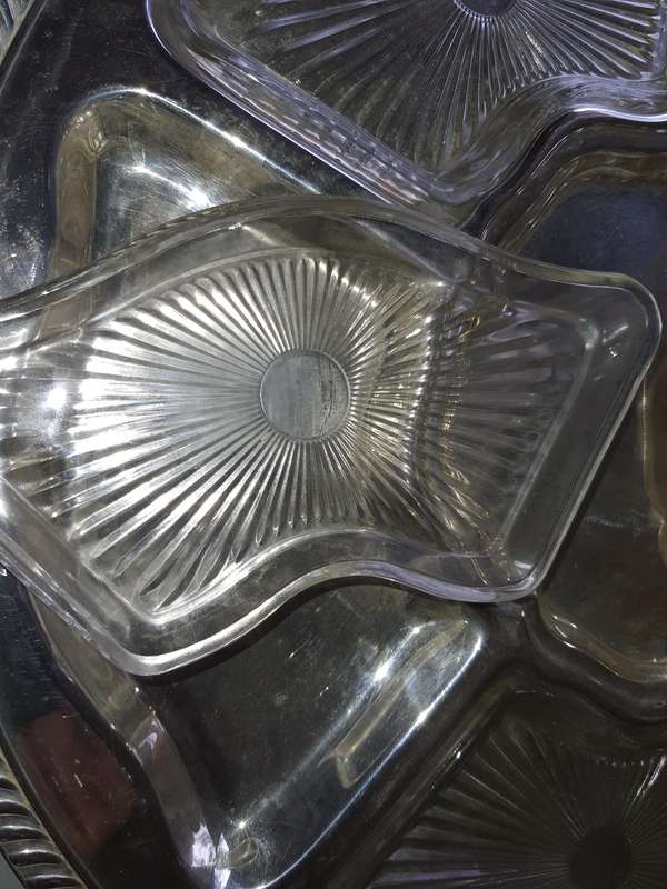 A VINTAGE SILVER PLATED LAZY SUZAN WITH GLASS INSERTS