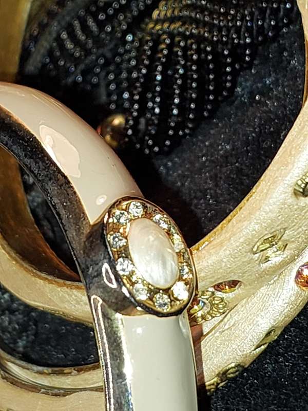 A COLLECTION OF VINTAGE COSTUME BRACELETS AND BANGLES