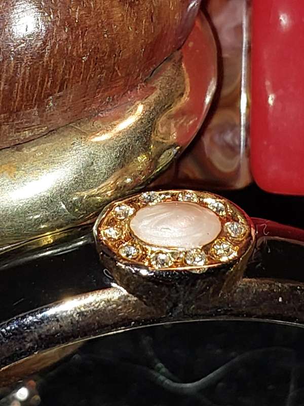A COLLECTION OF VINTAGE COSTUME BRACELETS AND BANGLES