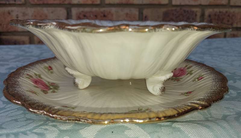 A VINTAGE CROWN DUCAL SALAD DRAINER AND UNDER PLATE FINE ROSES