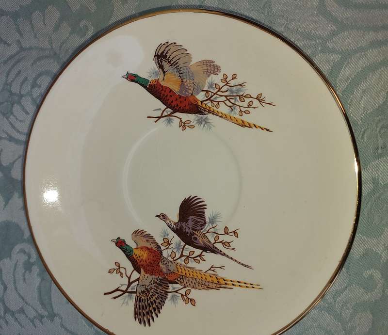 A VINTAGE COLLECTABLE CROWN DEVON FIELDING  FLYING PHEASANTS TEA CUP AND SAUCER