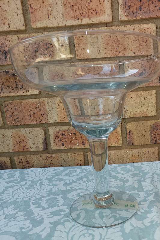 A 26 CENTIMETER TALL ICE CREAM SERVING JAR OR A COCKTAIL FLUTE