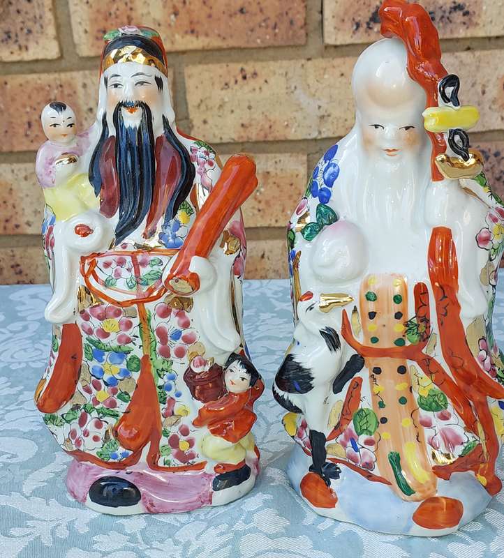 TWO VINTAGE CERAMIC CHINESE FIGURINES APPROXIMATELY 15-20 CMS IN HEIGHT