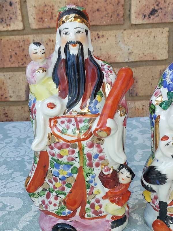 TWO VINTAGE CERAMIC CHINESE FIGURINES APPROXIMATELY 15-20 CMS IN HEIGHT