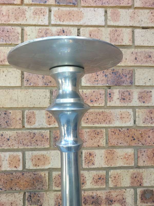TWO ART DECOR ALUMINUM ALLOY 106 CENTIMETRES IN HEIGHT CANDLE STANDS