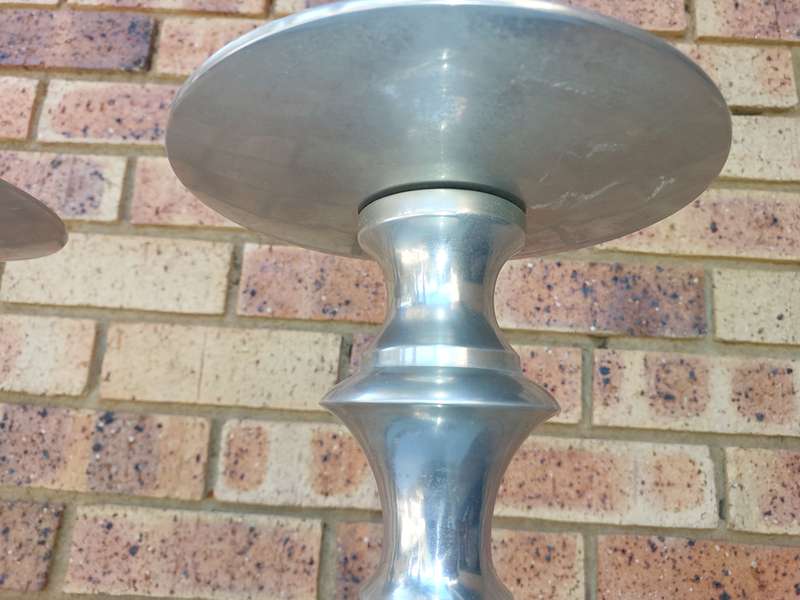 TWO ART DECOR ALUMINUM ALLOY 106 CENTIMETRES IN HEIGHT CANDLE STANDS
