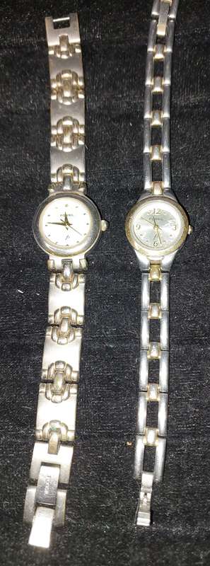 TWO VINTAGE FOSSIL WATCHES SOLD AS IS NOT TESTED.