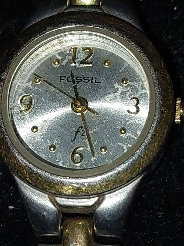 TWO VINTAGE FOSSIL WATCHES SOLD AS IS NOT TESTED.