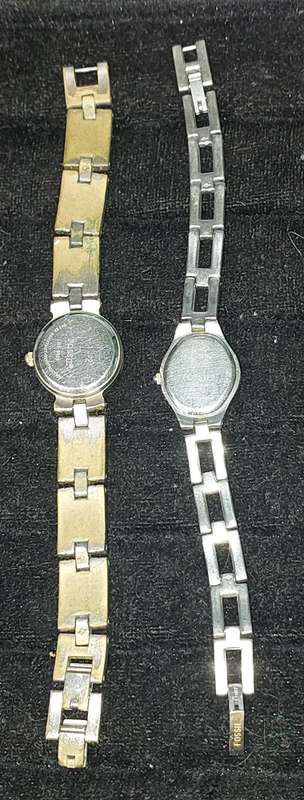 TWO VINTAGE FOSSIL WATCHES SOLD AS IS NOT TESTED.