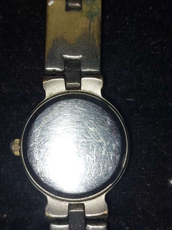 TWO VINTAGE FOSSIL WATCHES SOLD AS IS NOT TESTED.