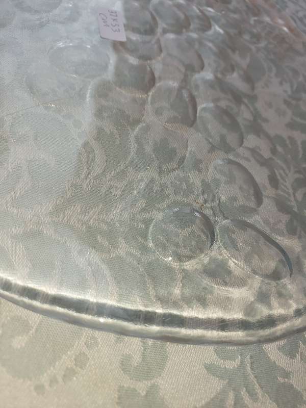 AN ART DECOR GLASS FRUIT PLATTER WITH A GRAPE VINE DESIGN SOLD AS IS