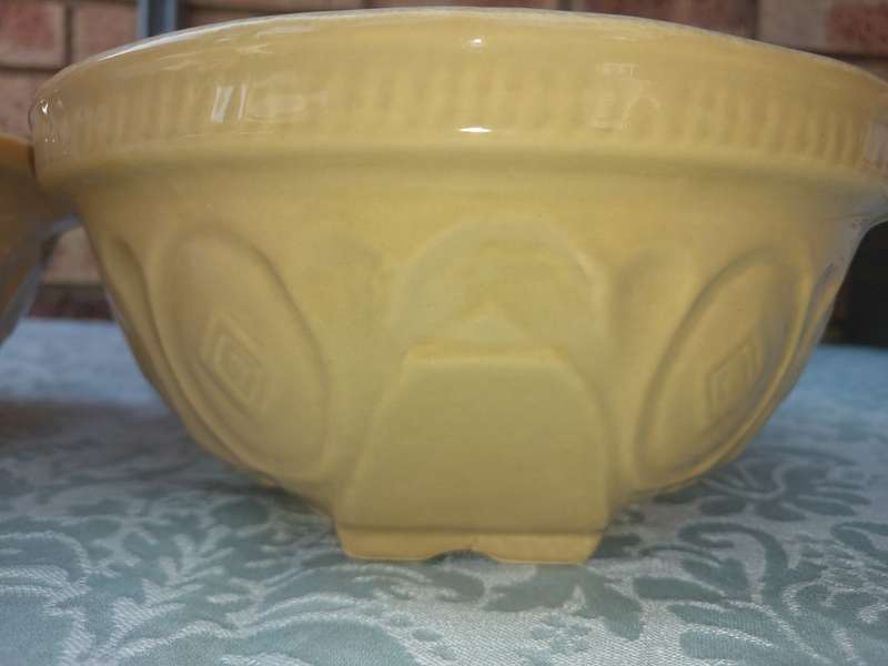 A PAIR TAN CERAMIC SERVING BOWLS