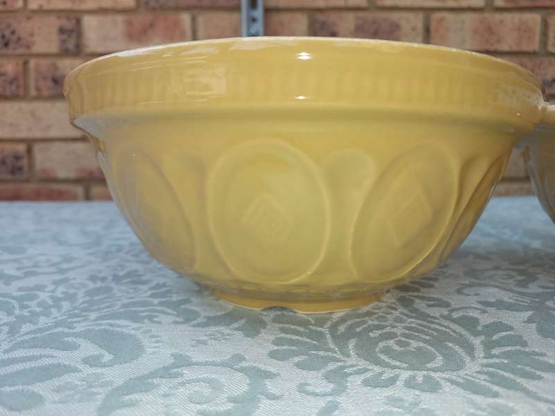 A PAIR TAN CERAMIC SERVING BOWLS