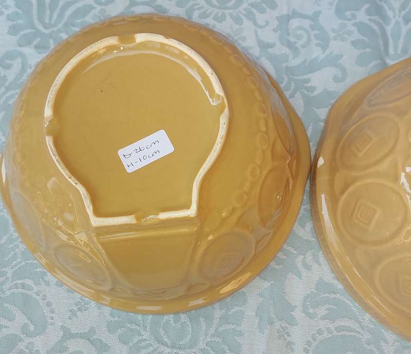 A PAIR TAN CERAMIC SERVING BOWLS