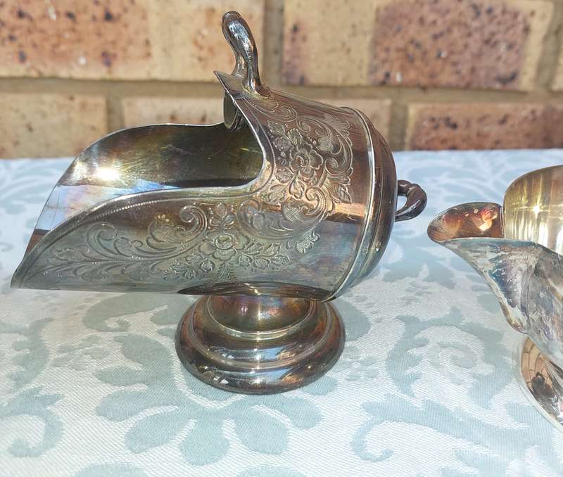 A COLLECTION OF VINTAGE EPNS KITCHEN UTENSILS