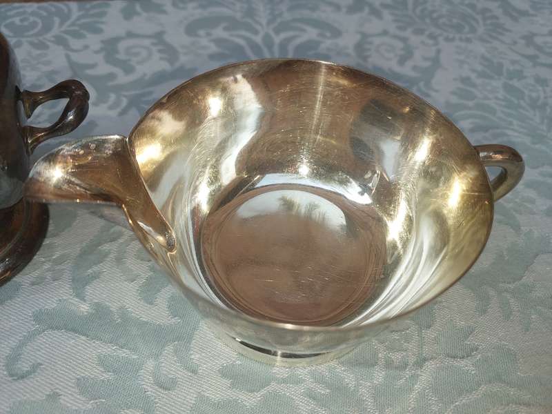 A COLLECTION OF VINTAGE EPNS KITCHEN UTENSILS