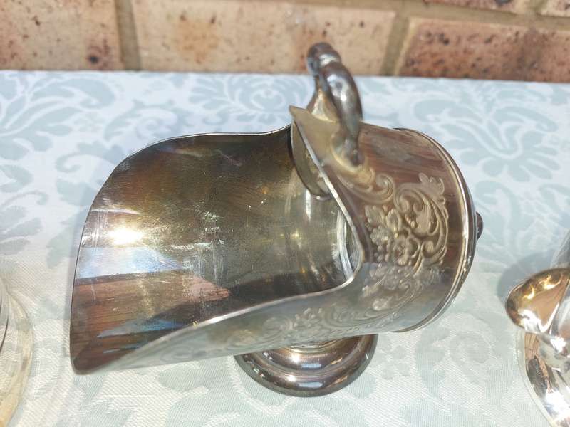 A COLLECTION OF VINTAGE EPNS KITCHEN UTENSILS