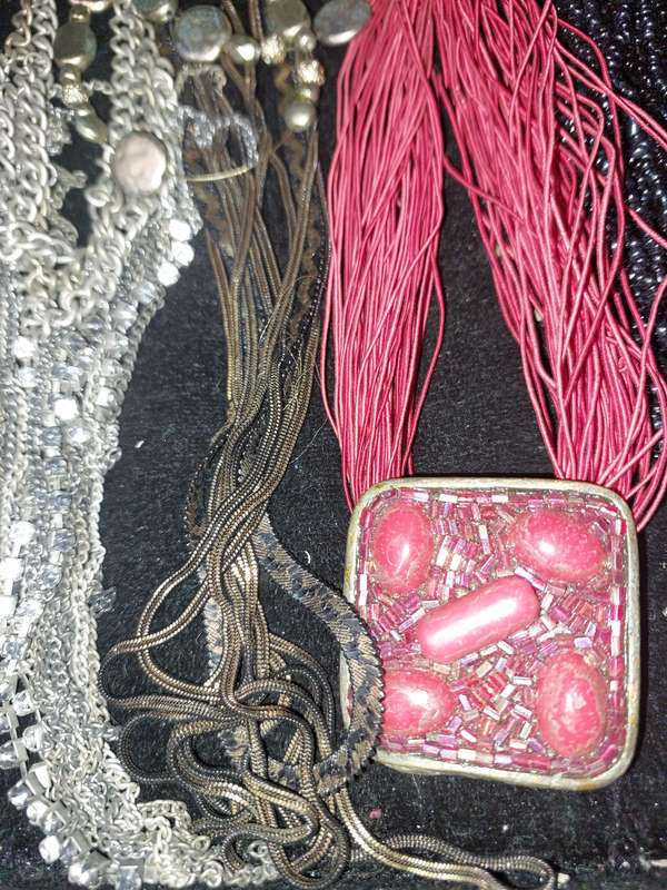 A COLLECTION OF COSTUME NECKLACES SOLD AS IS