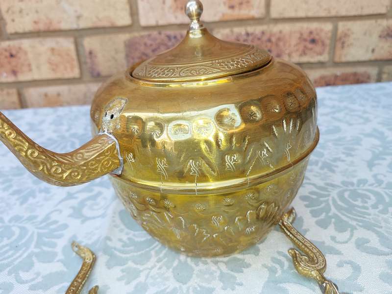 AN ART DECOR BRASS KETTLE HANDLE NEEDS TO BE RIVETTED ON THE BODY