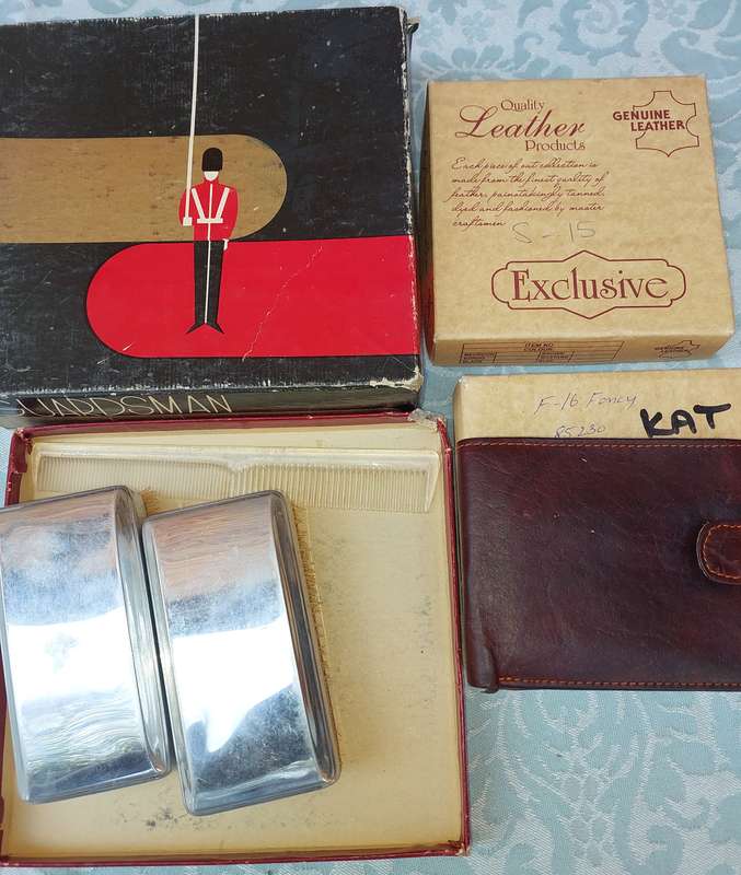 A LEATHER WALLETS AND A SET OF GROOMING BRUSHES